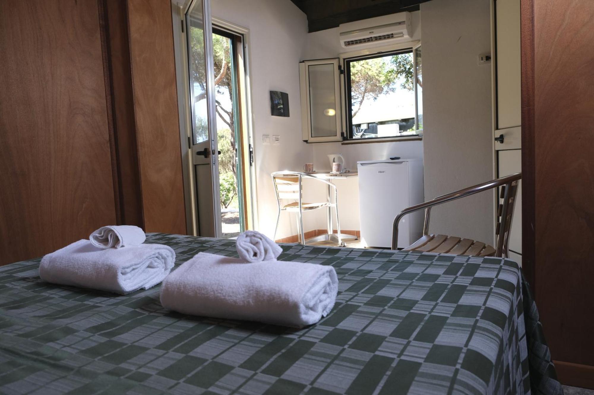 Villaggio Camping Torre Del Porticciolo Porto Conte Szoba fotó